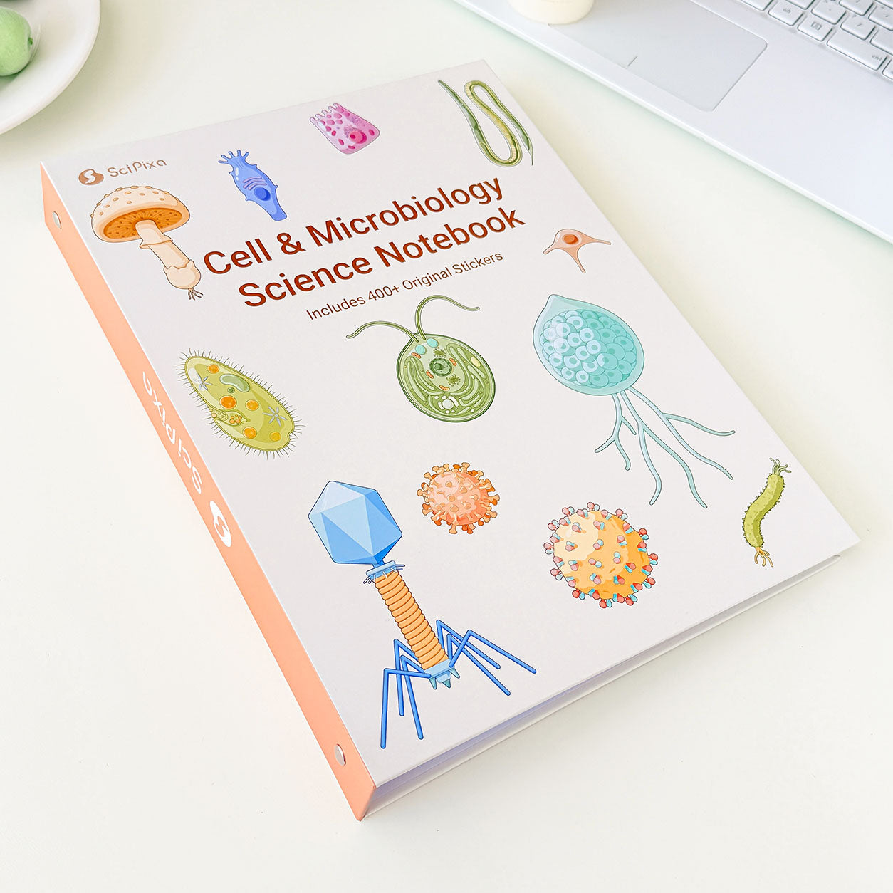 Science notebook with microbiology, bacteria, virus, and cell illustrations for students and researchers.