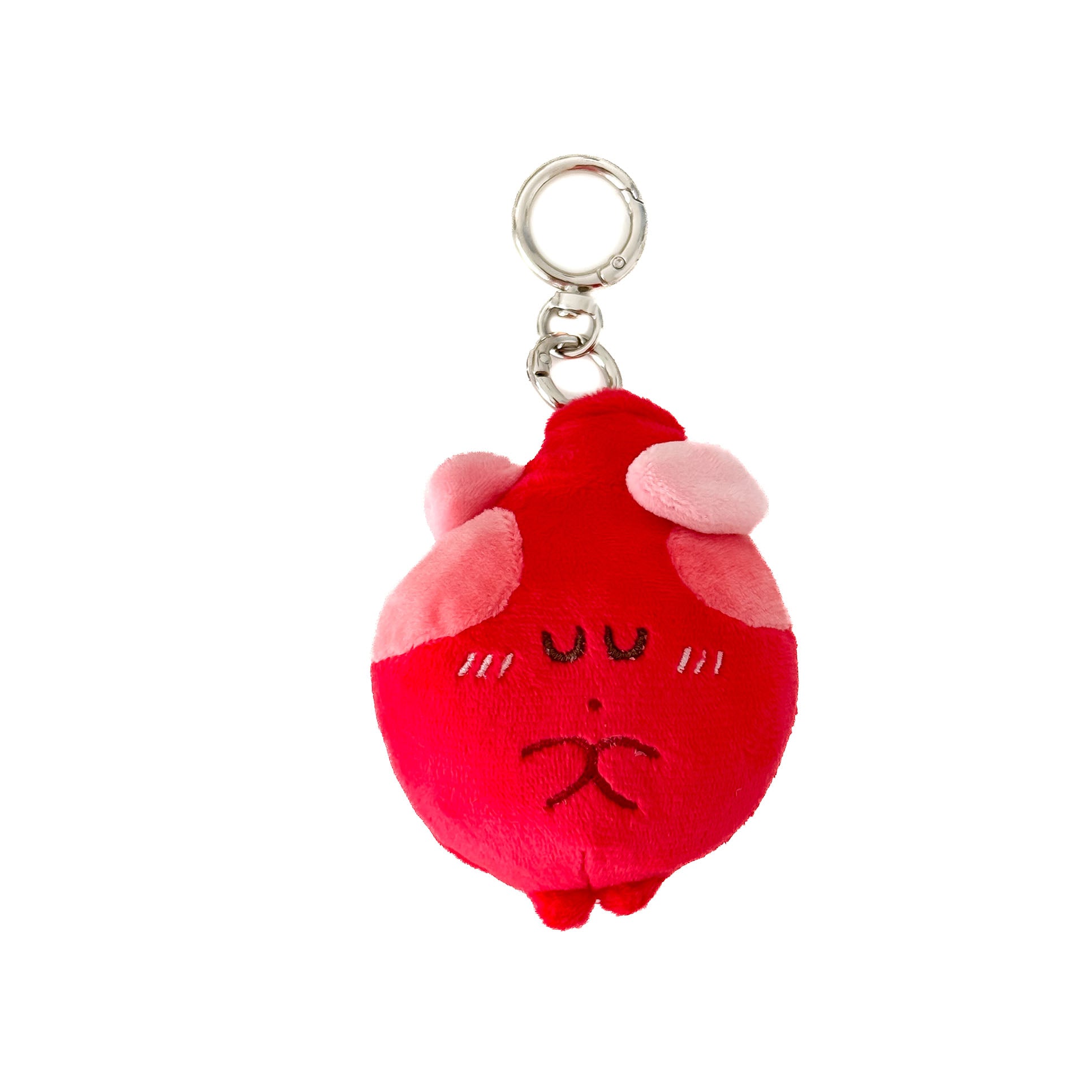 Cute heart plush keychain with an embroidered sleepy face and soft red anatomy-inspired design.