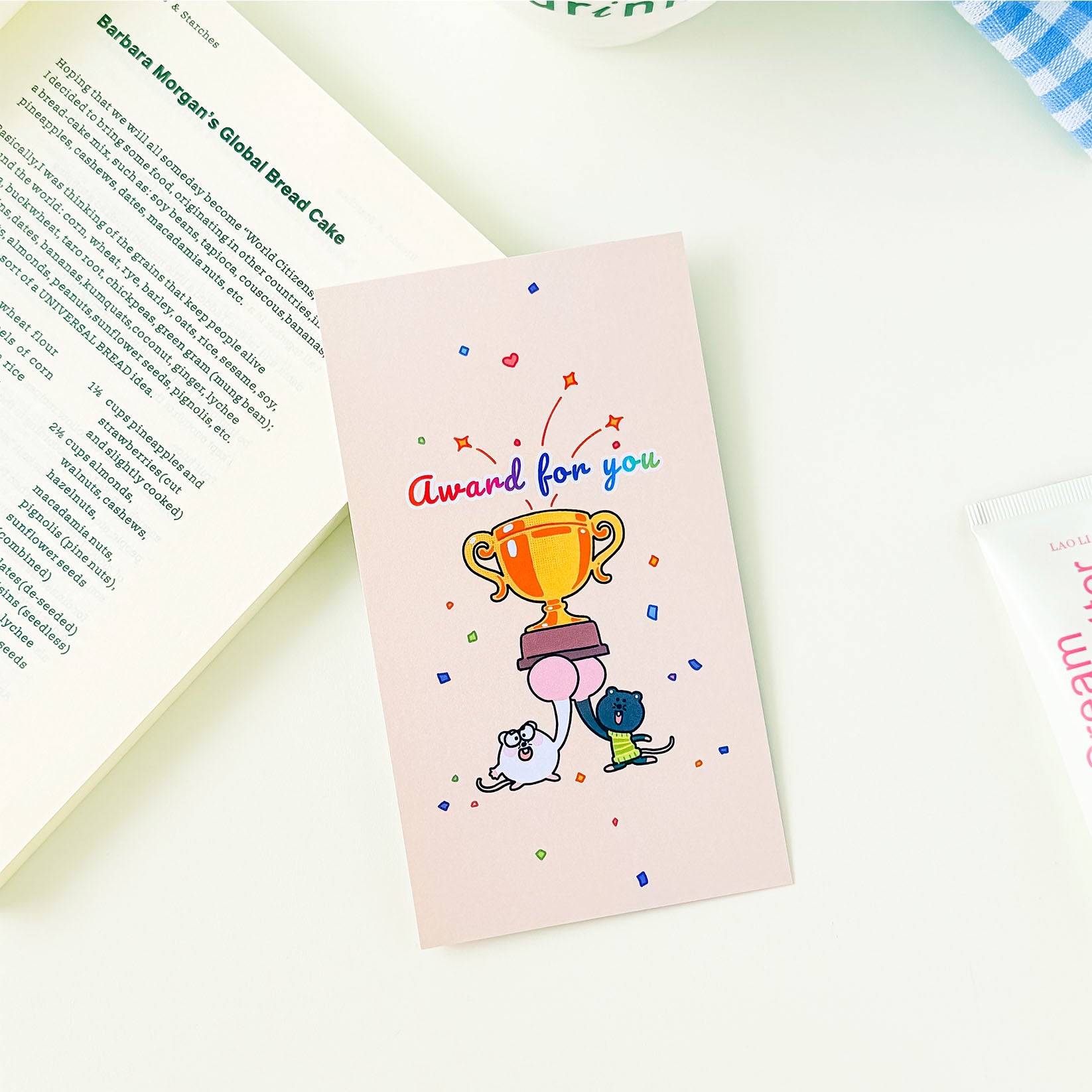 Cartoon mouse memo pad with a trophy illustration and playful congratulatory artwork for school, office, and daily notes.