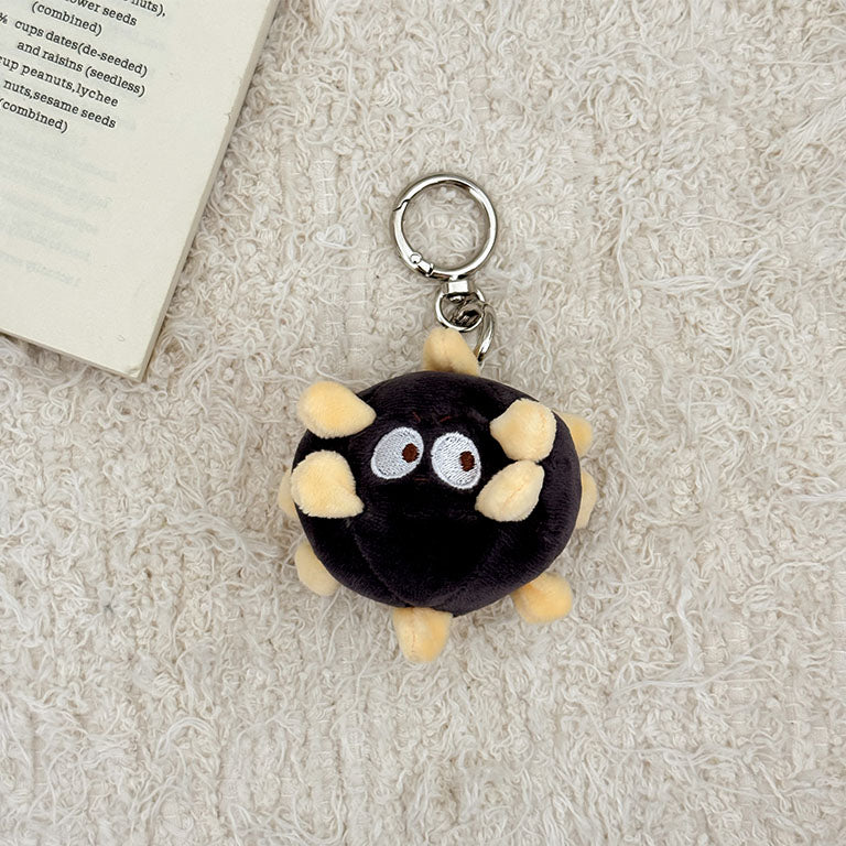 Cartoon virus plush keychain with silver clasp and cuddly science-themed design.