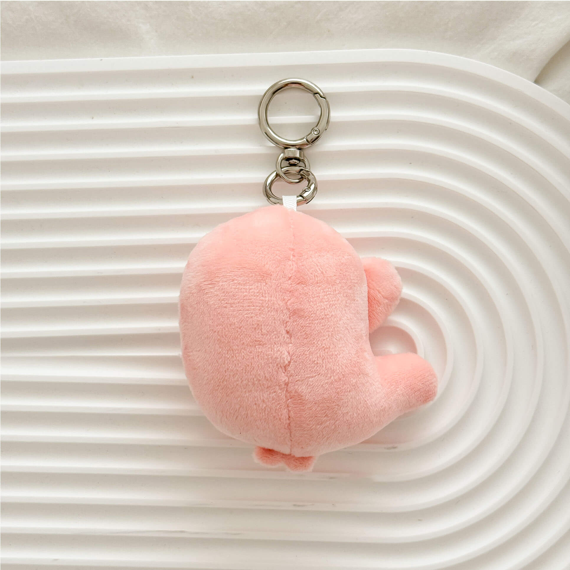 Adorable anatomy stomach plush keychain with soft fabric, cute face, and silver keychain hardware.