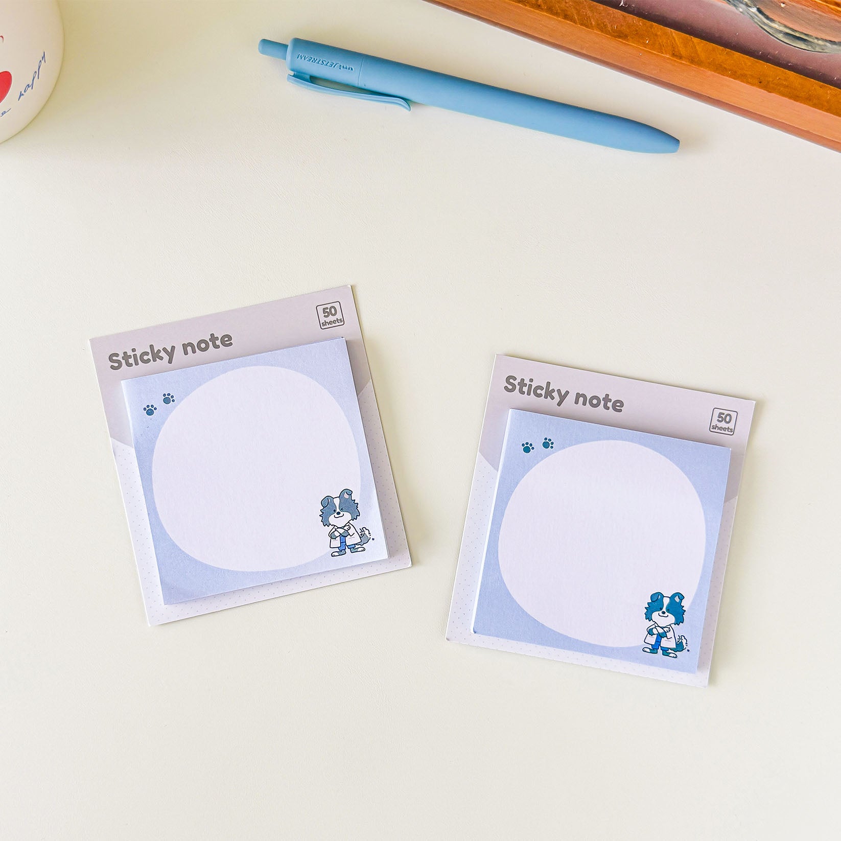 Blue stationery sticky notes decorated with a Border Collie laboratory character, perfect for journaling, studying, and work.