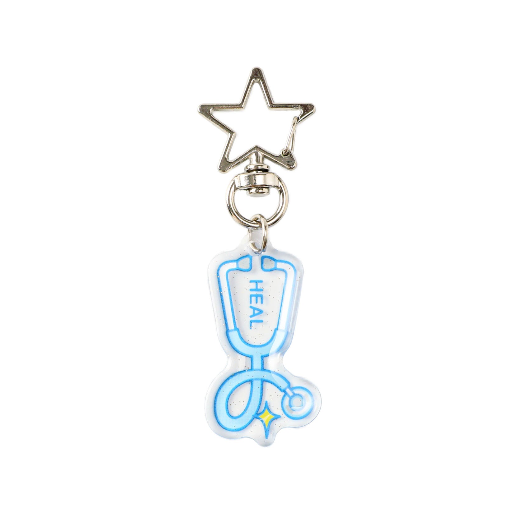 Blue glitter acrylic stethoscope keychain with transparent finish, star-shaped metal clasp, and cute medical-themed accessory for keys and bags.
