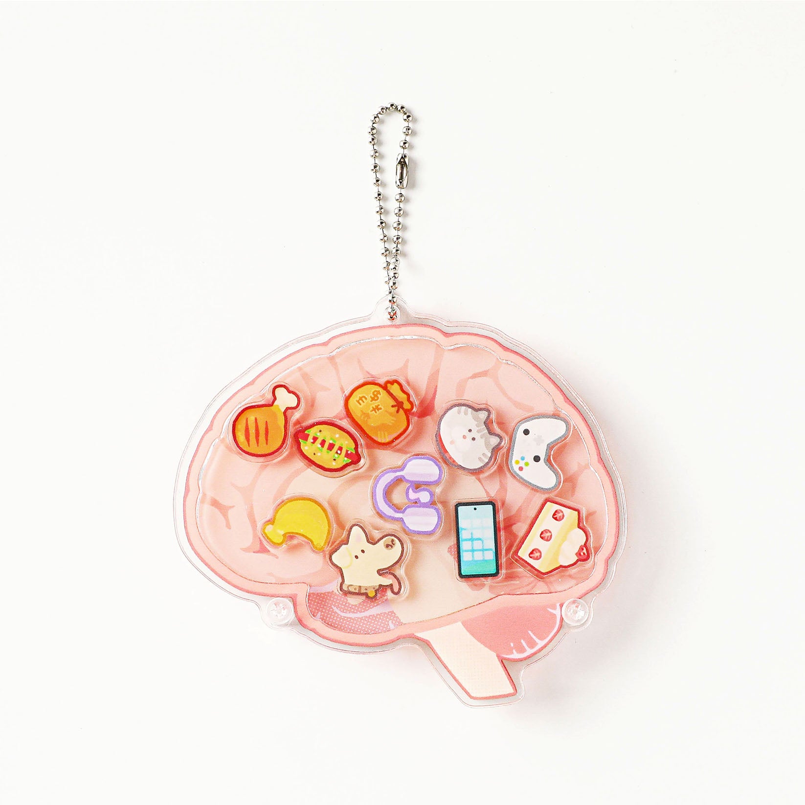 Transparent acrylic brain charm with colorful miniature symbols representing thoughts, learning, and creativity, designed as a unique accessory for backpacks, keys, or lab gear.