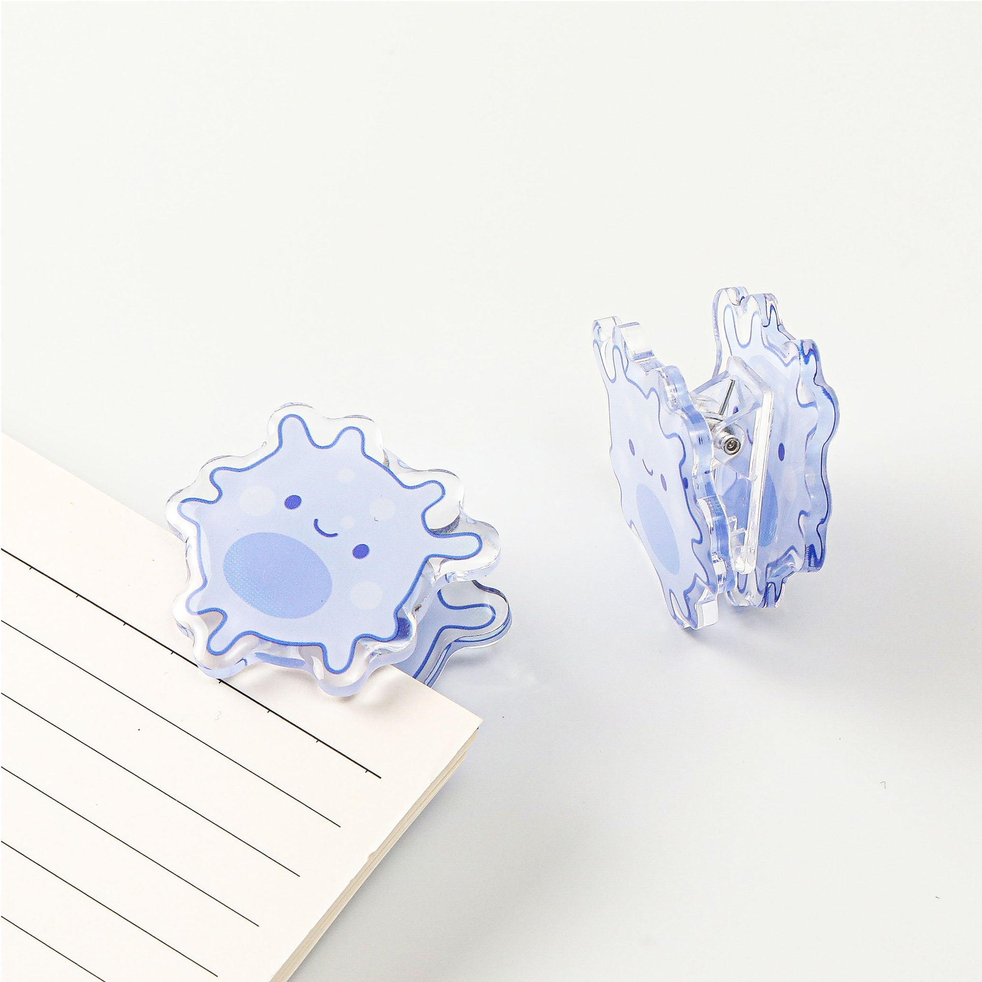 Cartoon purple cell acrylic stationery clip with a playful scientific theme, great for decorating folders while keeping papers neatly in place.