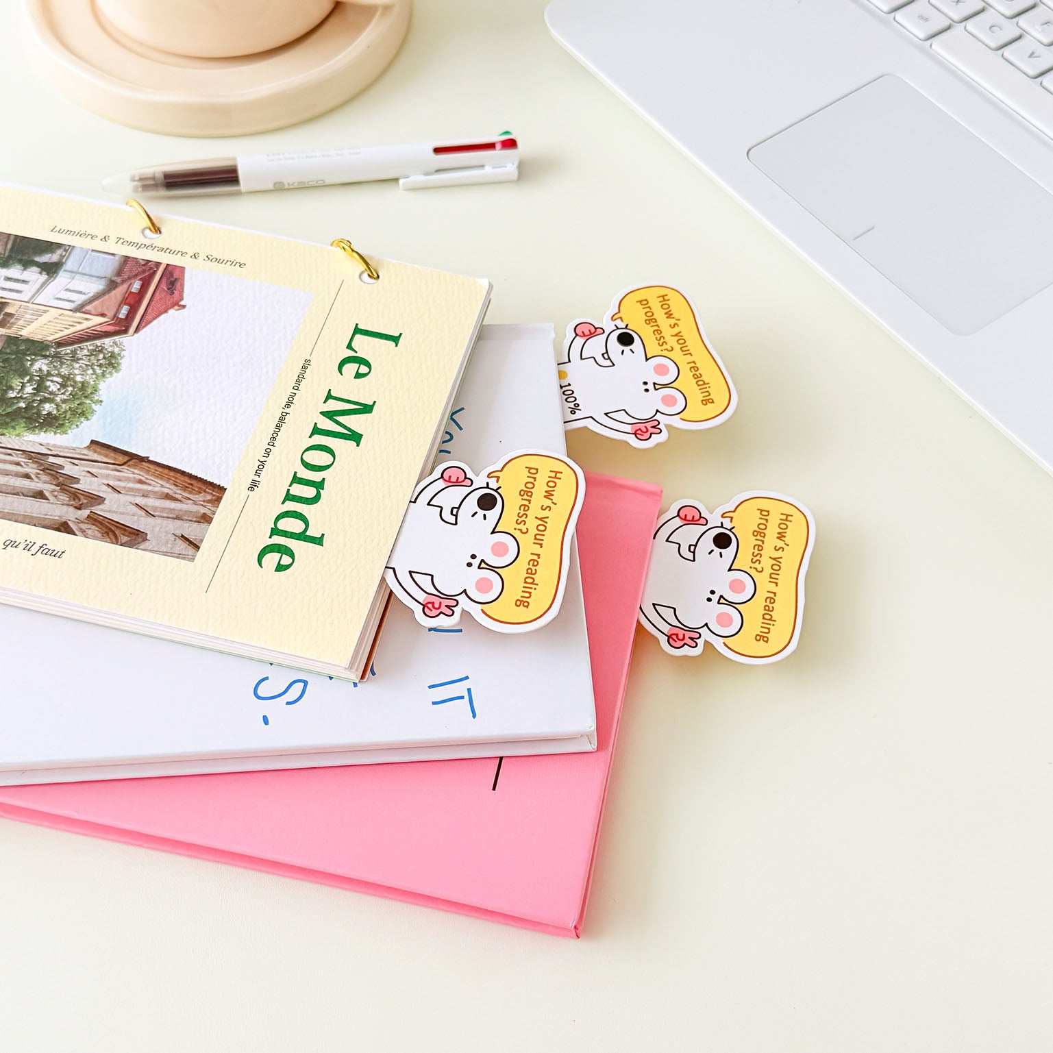 Cute animal bookmark with reading progress indicators, cartoon mouse artwork, and durable laminated finish.
