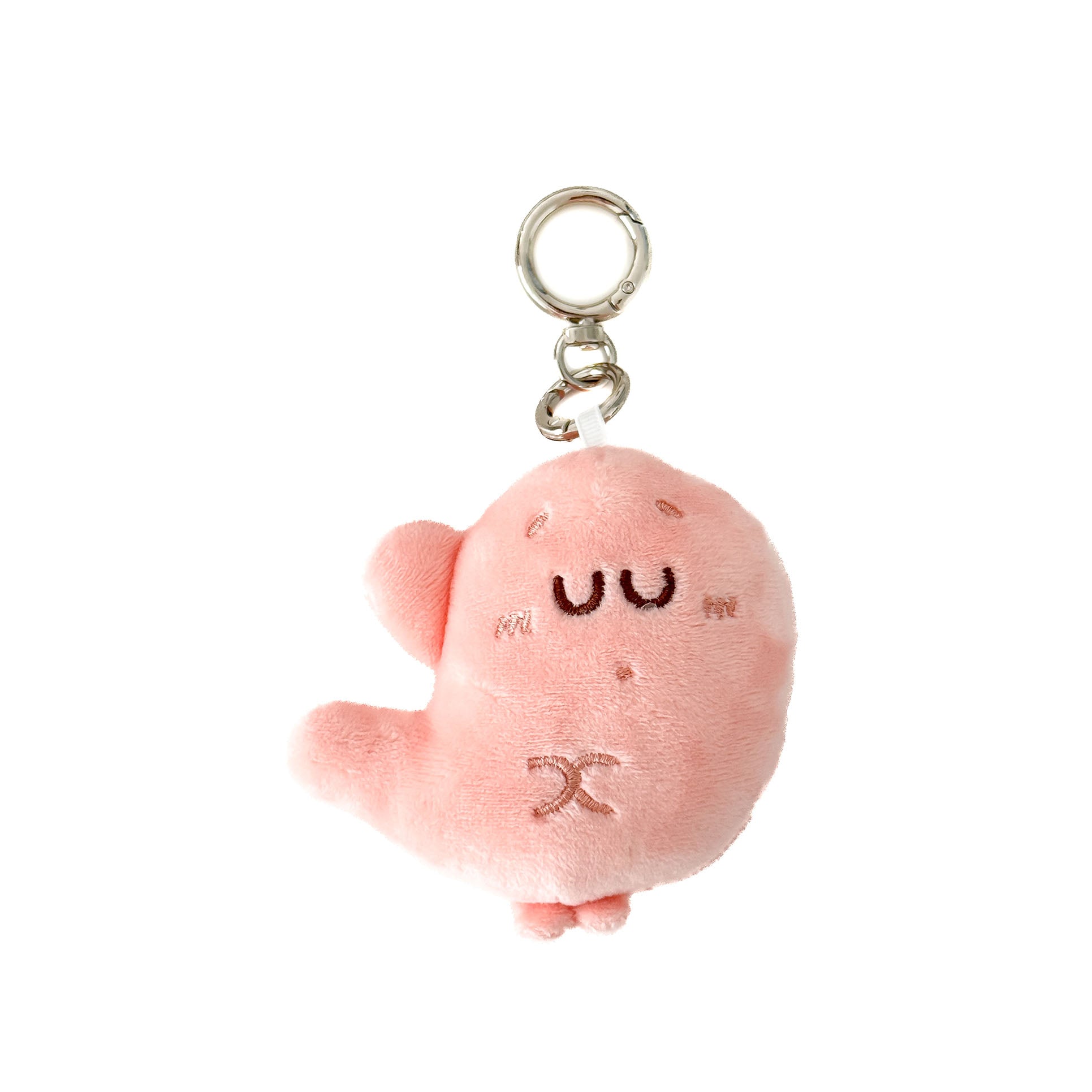 Cute pink plush stomach keychain with embroidered smiling face and silver metal key ring.